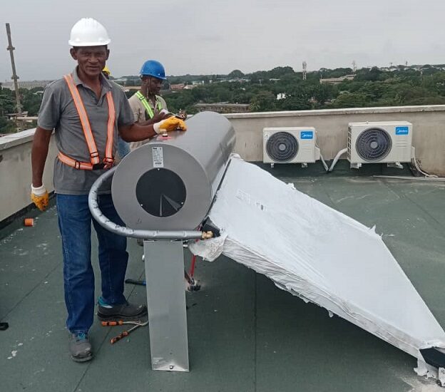 Our technicians installing a solar water heater